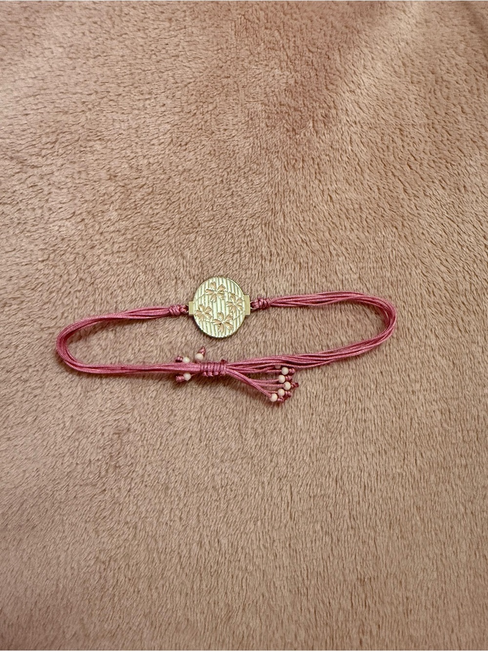 Delicate Pink Cord Bracelet with Gold Floral Charm
